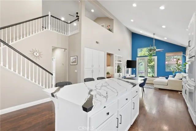 a view of living room with furniture and a large window