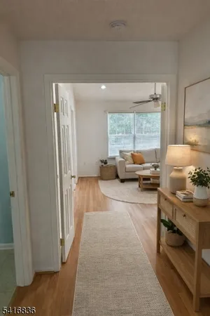 a living room with furniture and a table
