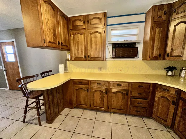 a bathroom with a sink a mirror and a bathtub