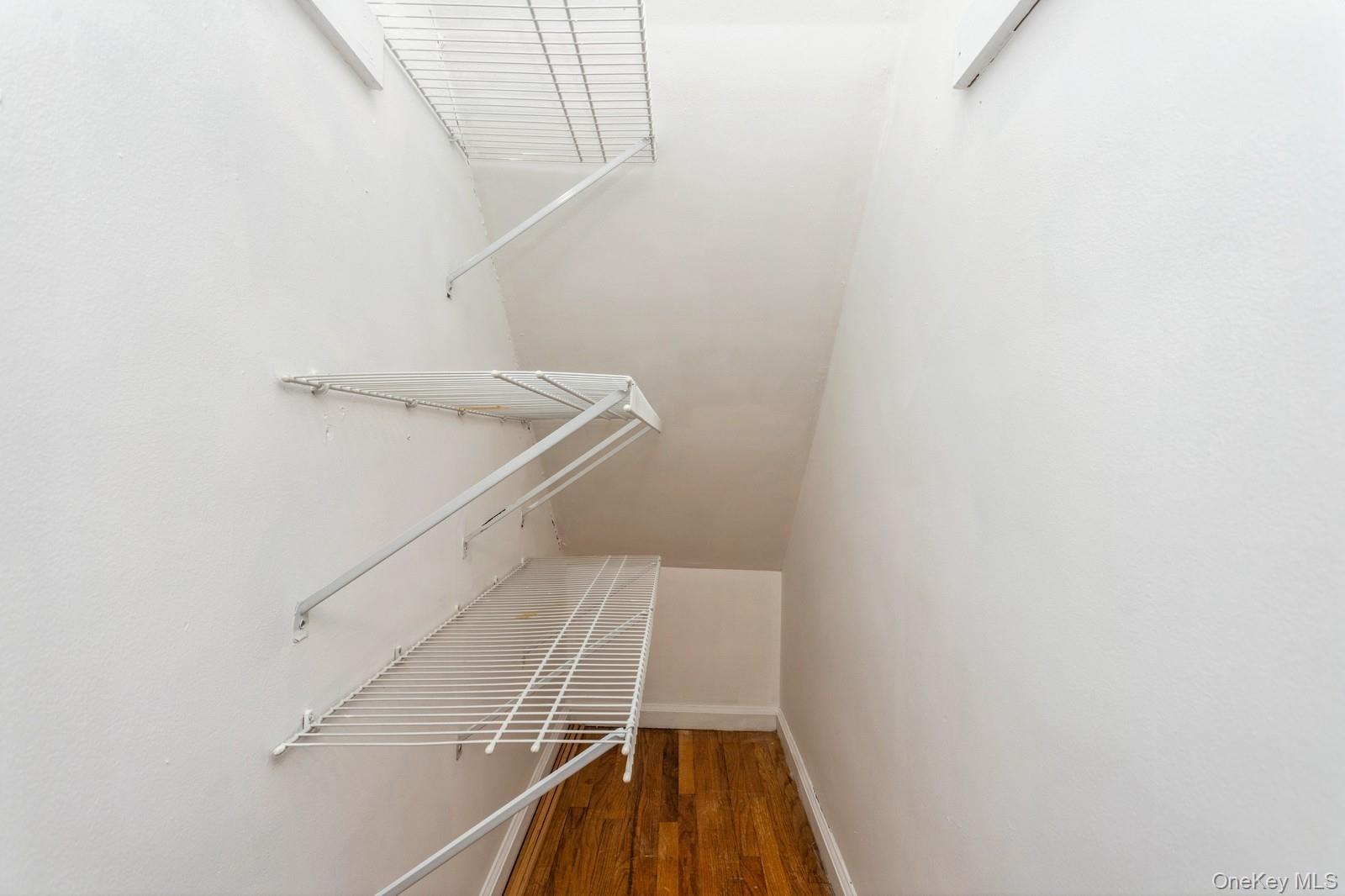 51 Cross Street, Unit 3A Yonkers, NY 10708 - Photo 14 of 17 Walk in closet featuring wood finished floors