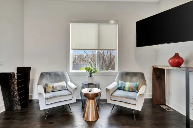 a living room with furniture and a couch