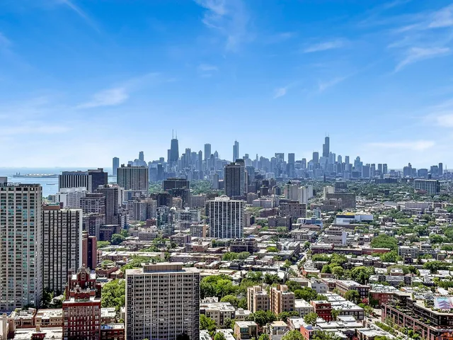 a view of a city with tall buildings