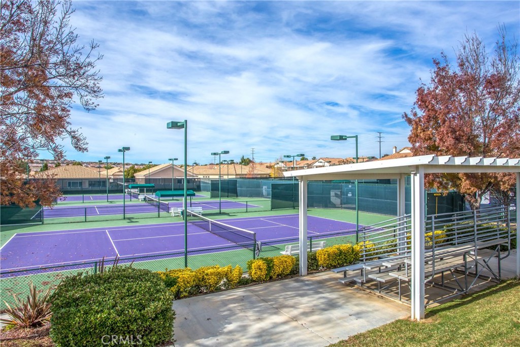 680 Indian Wells Road Banning, CA 92220 - Photo 35 of 37 a view of a tennis ground with large trees
