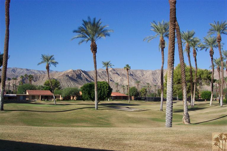 66 La Ronda Drive Rancho Mirage, CA 92270 - Photo 1 of 8 a view of a park with palm trees