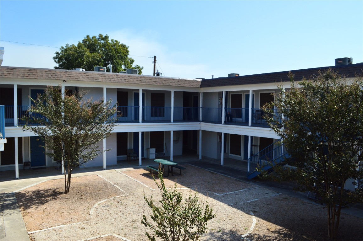4709 Harmon Avenue, Unit 333 Austin, TX 78751 - Photo 1 of 7 a view of a house with a yard and plants