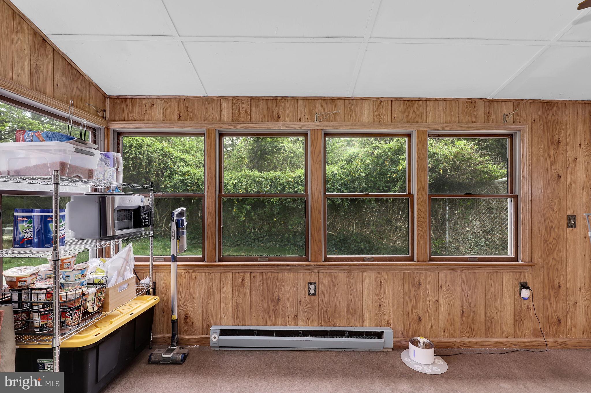 404 Biggs Avenue Frederick, MD 21702 - Photo 11 of 47 a living room with a couch and window
