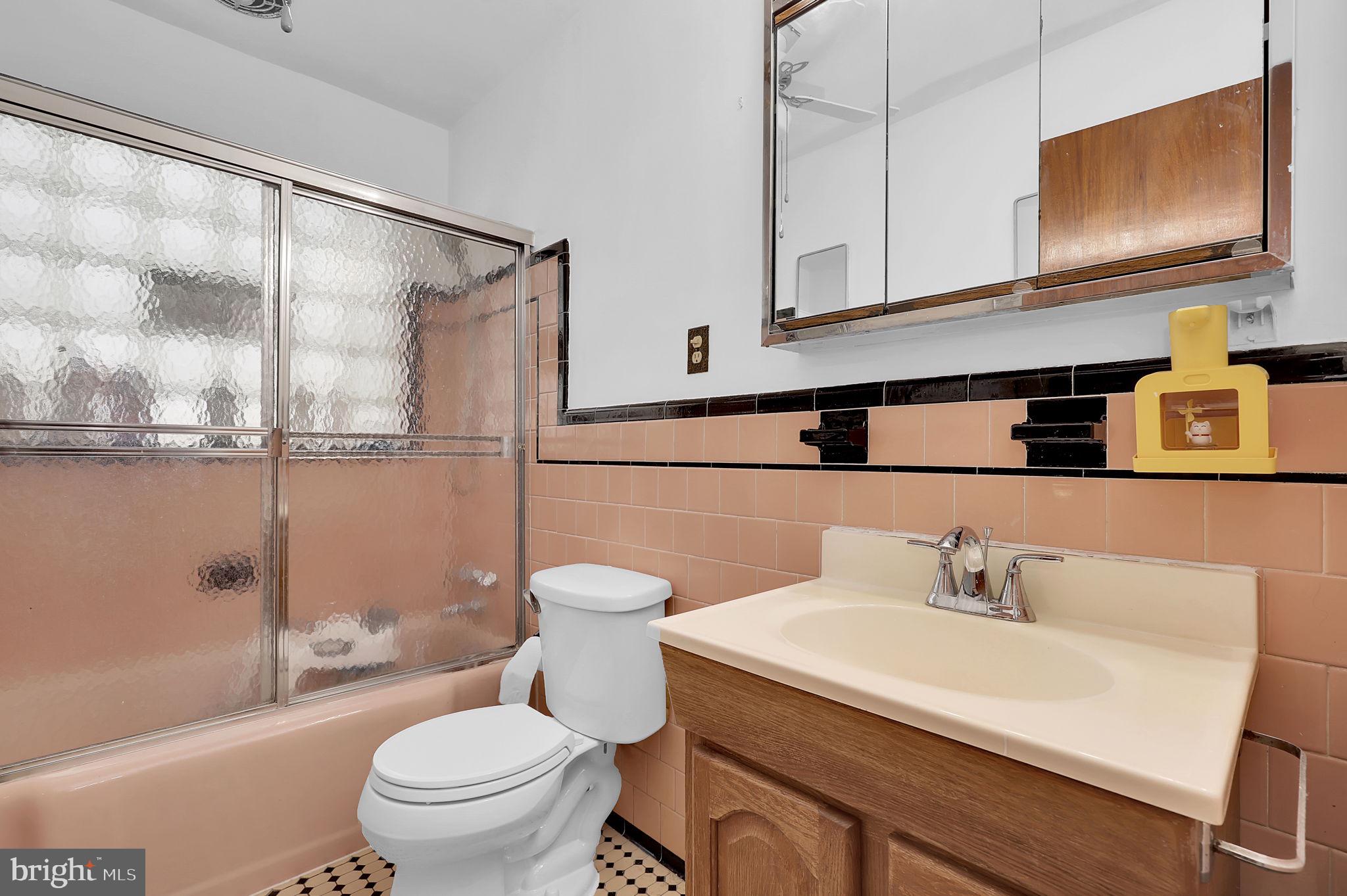 404 Biggs Avenue Frederick, MD 21702 - Photo 19 of 47 a bathroom with a sink a toilet and shower