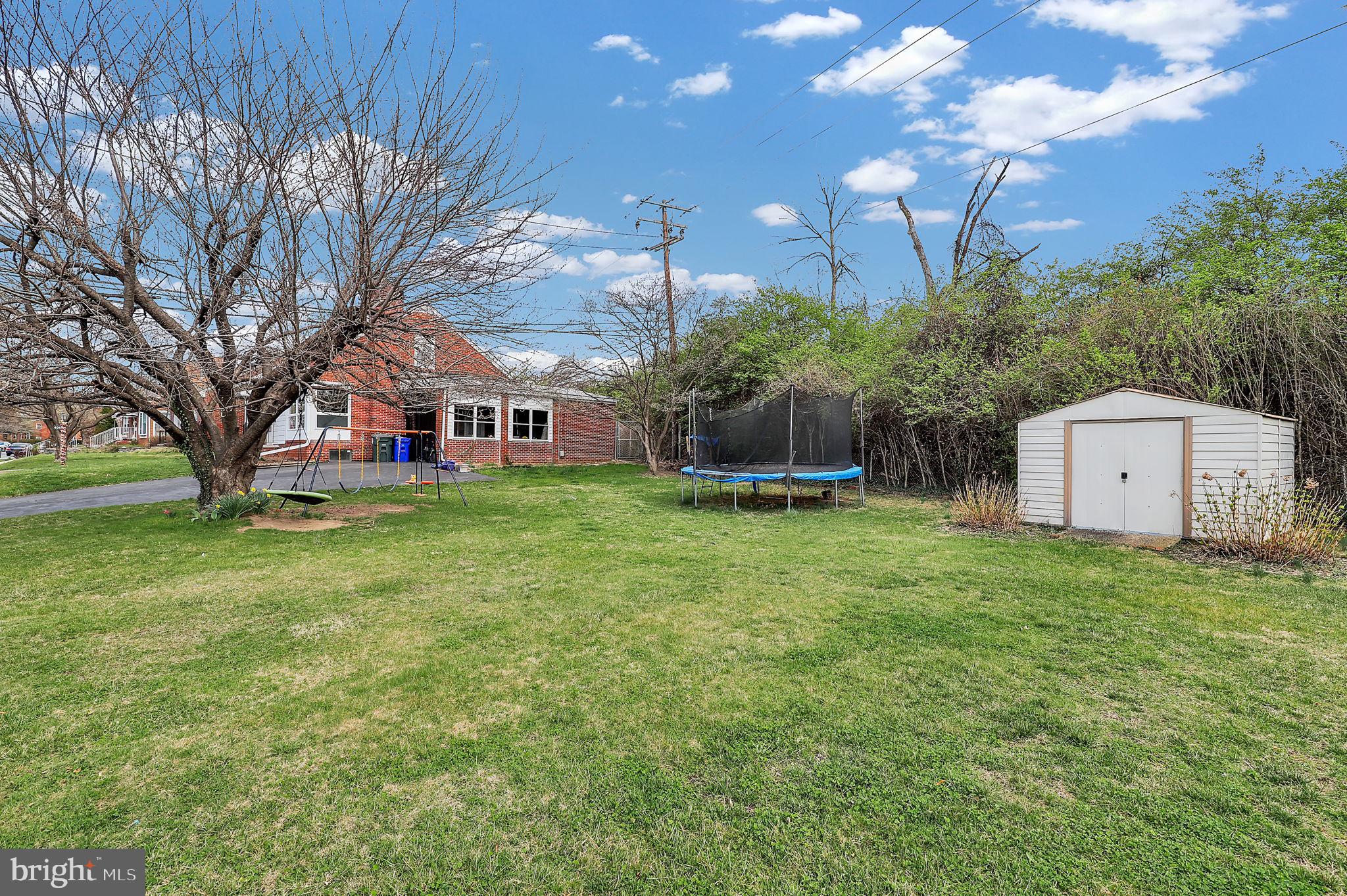 404 Biggs Avenue Frederick, MD 21702 - Photo 26 of 47 a view of a house with backyard and sitting area