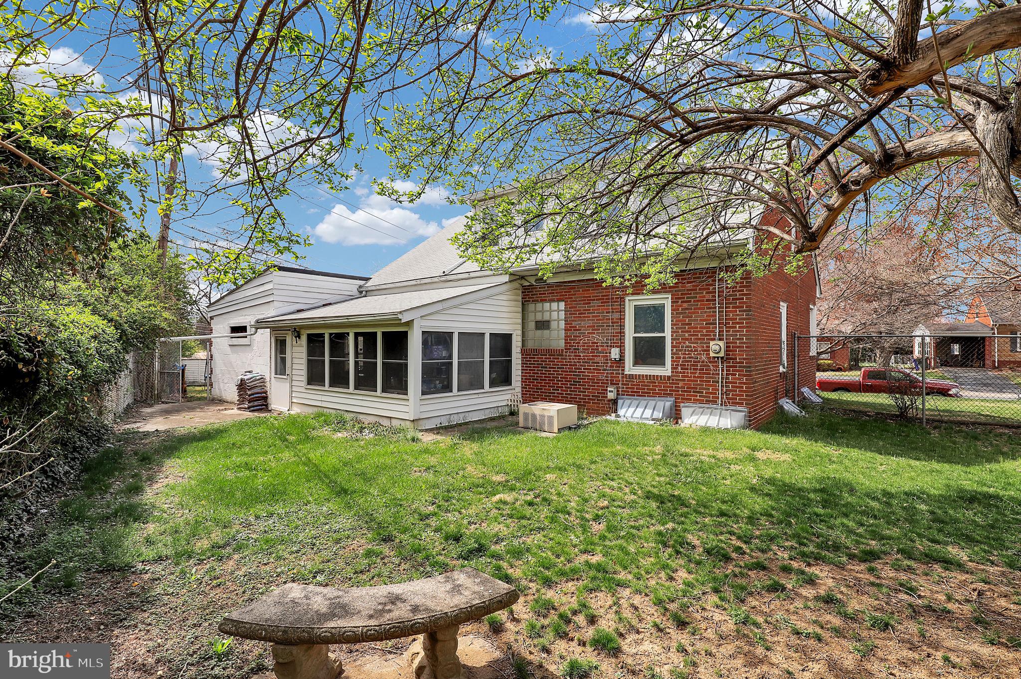 404 Biggs Avenue Frederick, MD 21702 - Photo 29 of 47 a view of a house with a yard