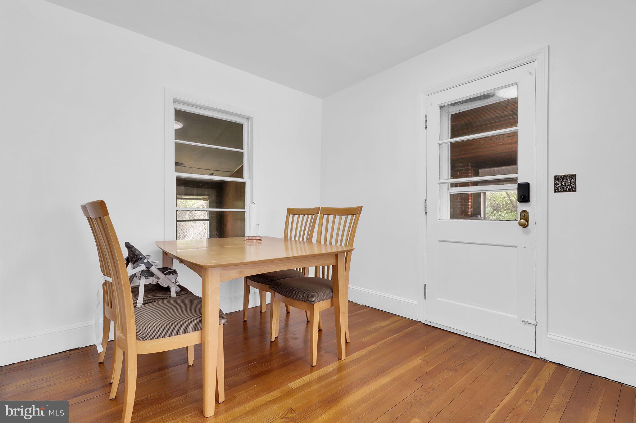 404 Biggs Avenue Frederick, MD 21702 - Photo 5 of 47 a view of a dining room with furniture and wooden floor