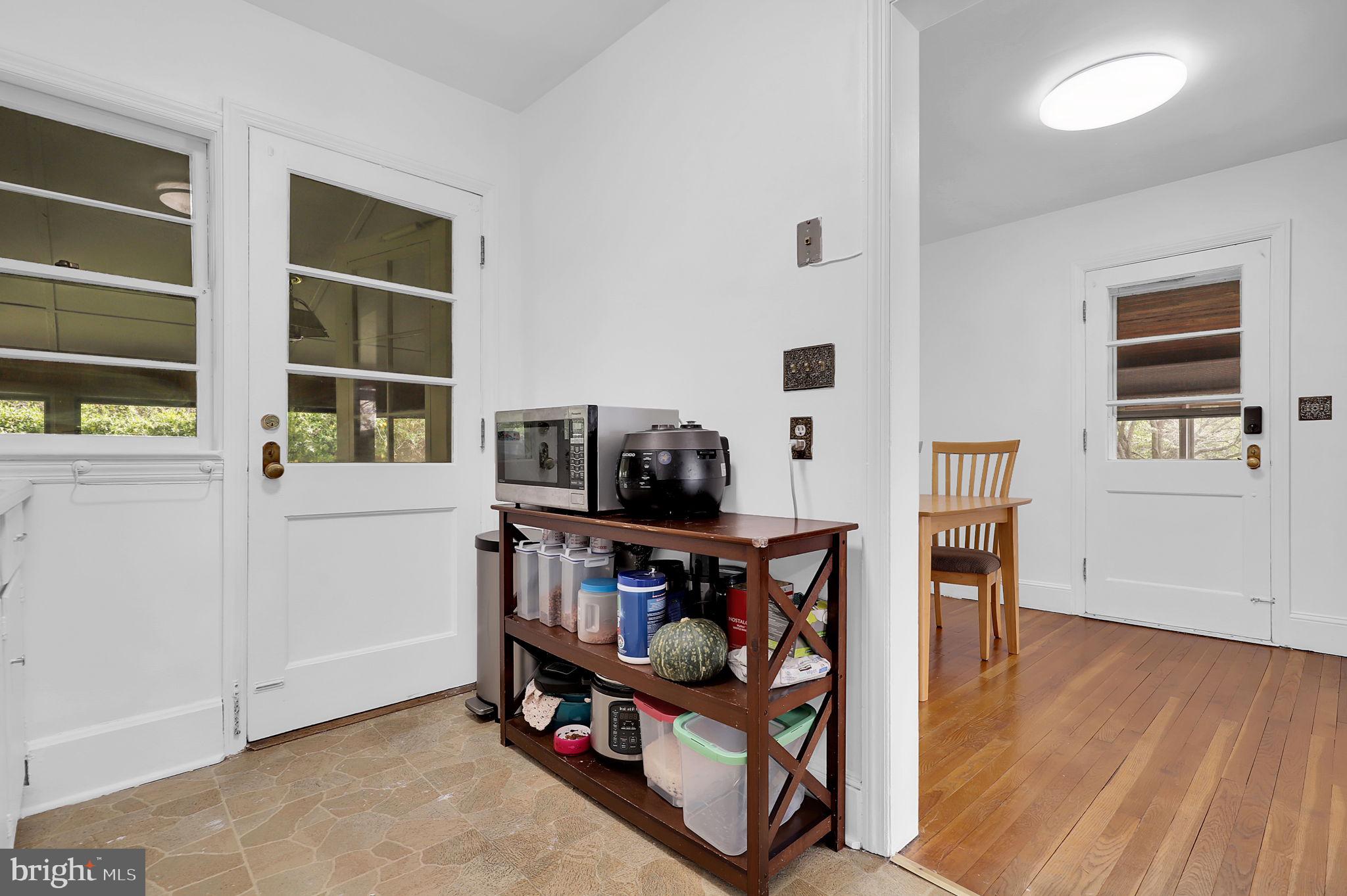 404 Biggs Avenue Frederick, MD 21702 - Photo 8 of 47 a view of a workspace with furniture and wooden floor