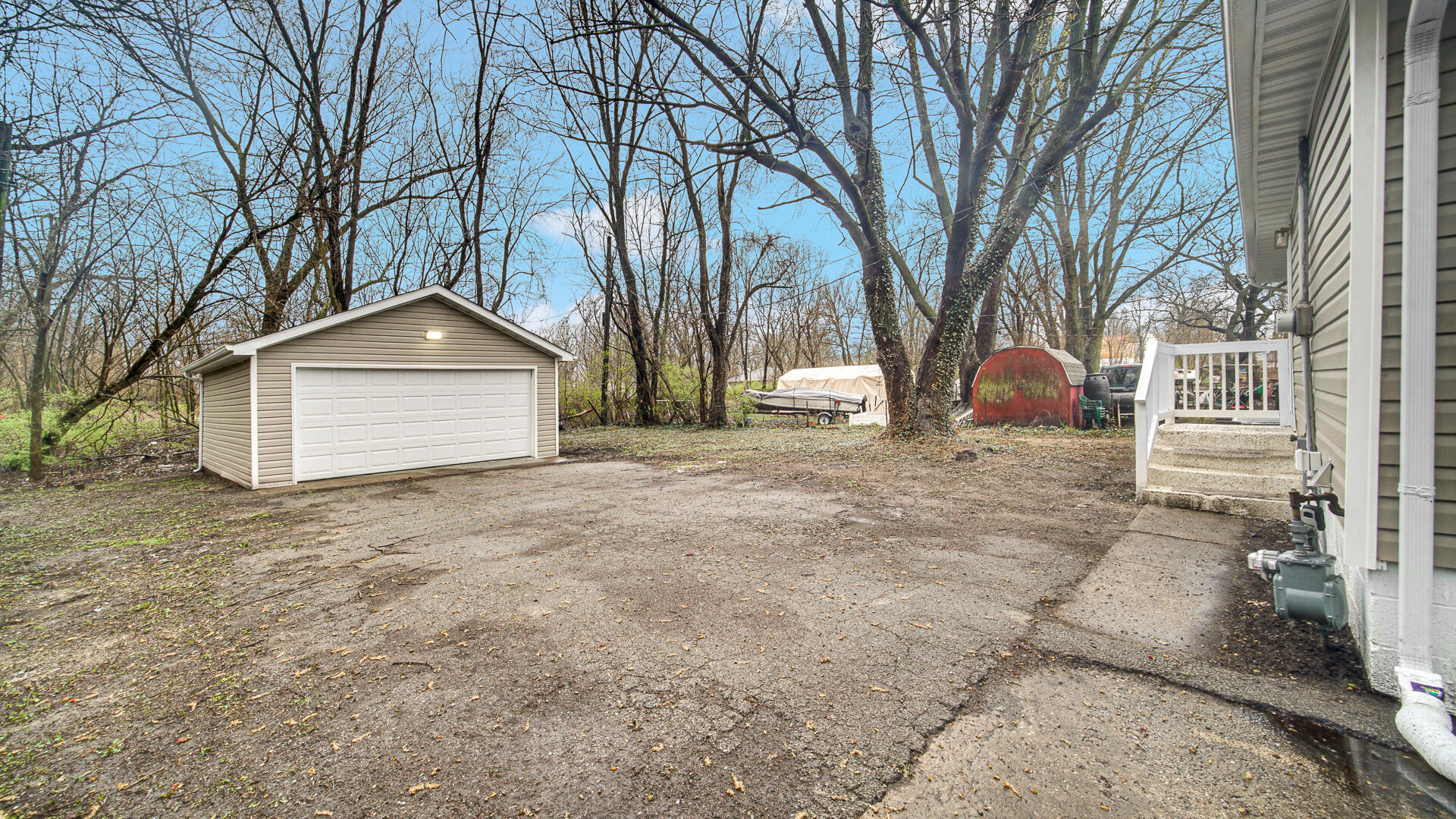1330 Idaho Street Gary, IN 46403 - Photo 21 of 23 a front view of a house with a yard and garage