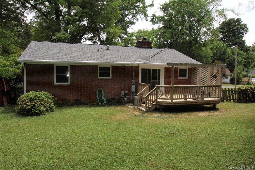 825 Manhasset Road Charlotte, NC 28209 - Photo 19 of 20 a front view of a house with garden
