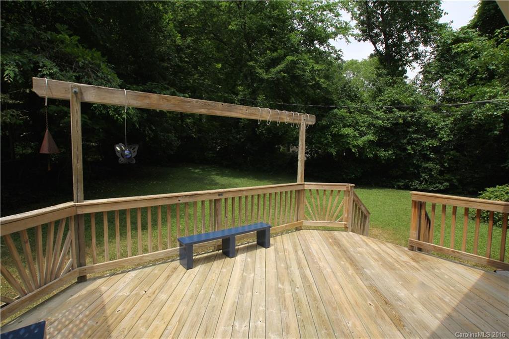 825 Manhasset Road Charlotte, NC 28209 - Photo 20 of 20 a view of balcony with wooden floor and outdoor seating