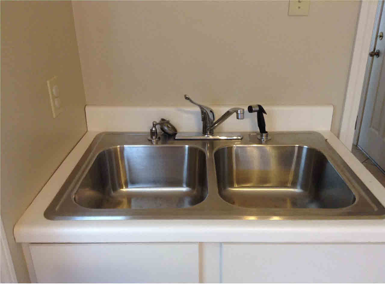 236 Pine Street Sebastopol, MS 39189 - Photo 34 of 40 Double Sink in Laundry Room