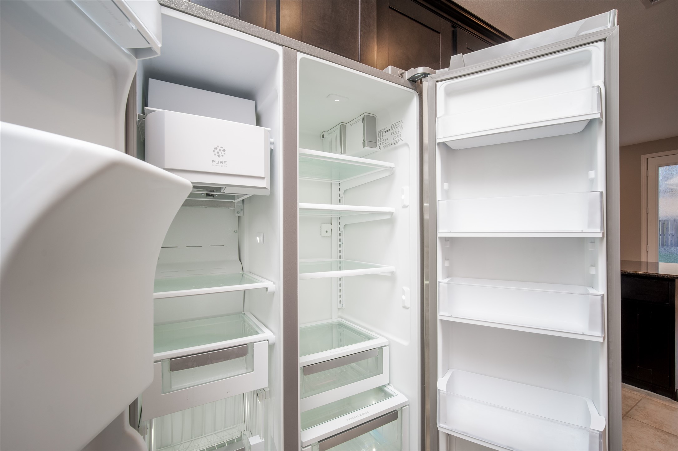 1826 Ryon Falls Drive Richmond, TX 77469 - Photo 16 of 35 a view of walk in closet with empty racks