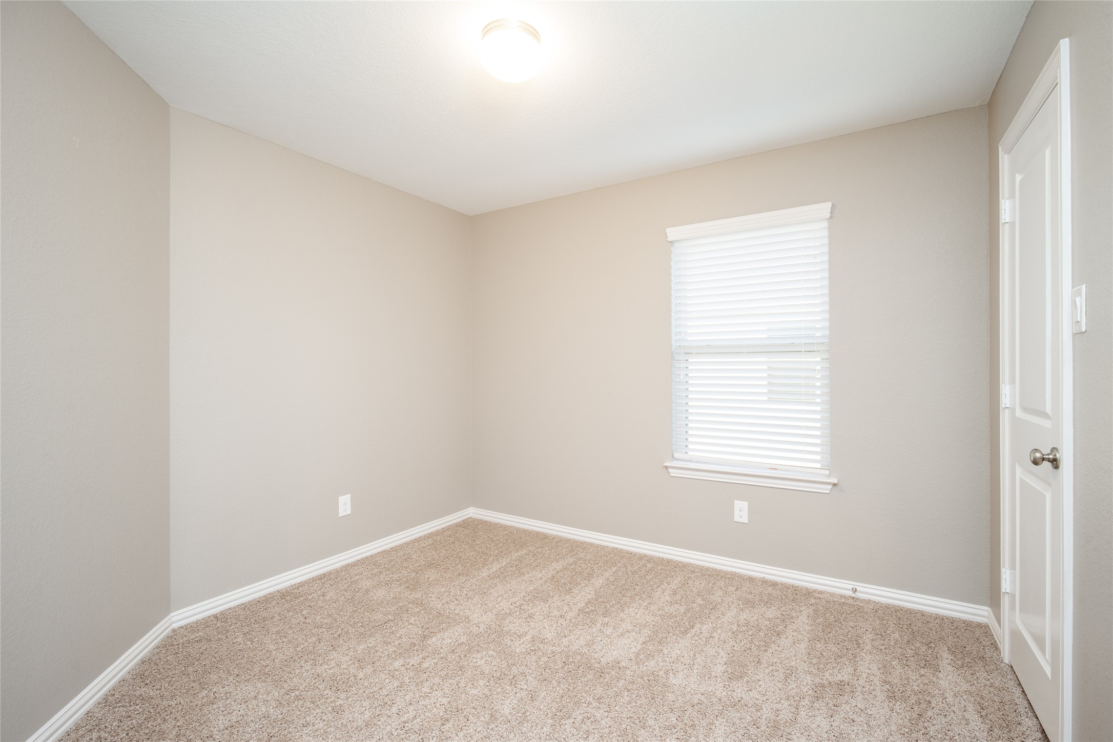 1826 Ryon Falls Drive Richmond, TX 77469 - Photo 22 of 35 an empty room with a window