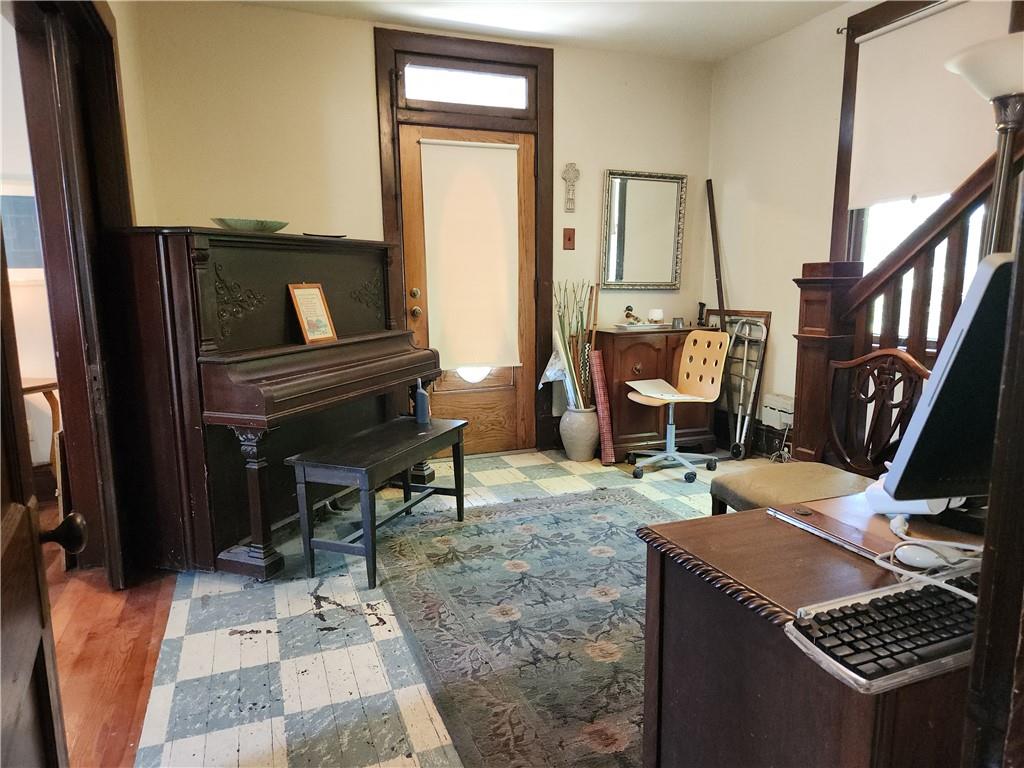 This entry way is large enough for a piano, office.
