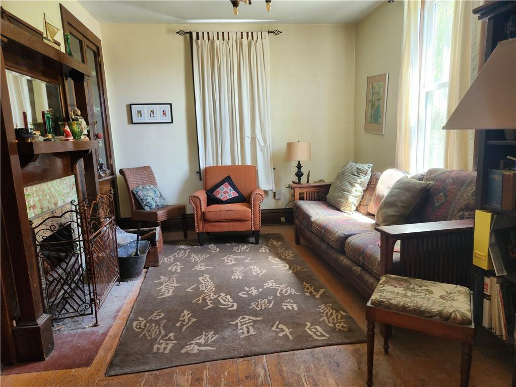 314 3rd Street Webster, PA 15087 - Photo 9 of 36 This room is set up as the livingroom, but you can flip flop these rooms. Fireplace and built-in china cupboards give cozy look to this room.