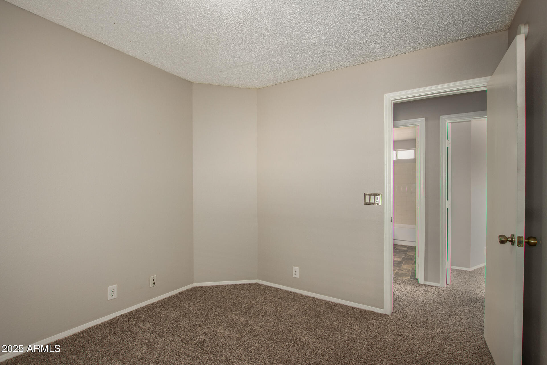 10015 North 66th Drive Glendale, AZ 85302 - Photo 13 of 20 a view of an empty room