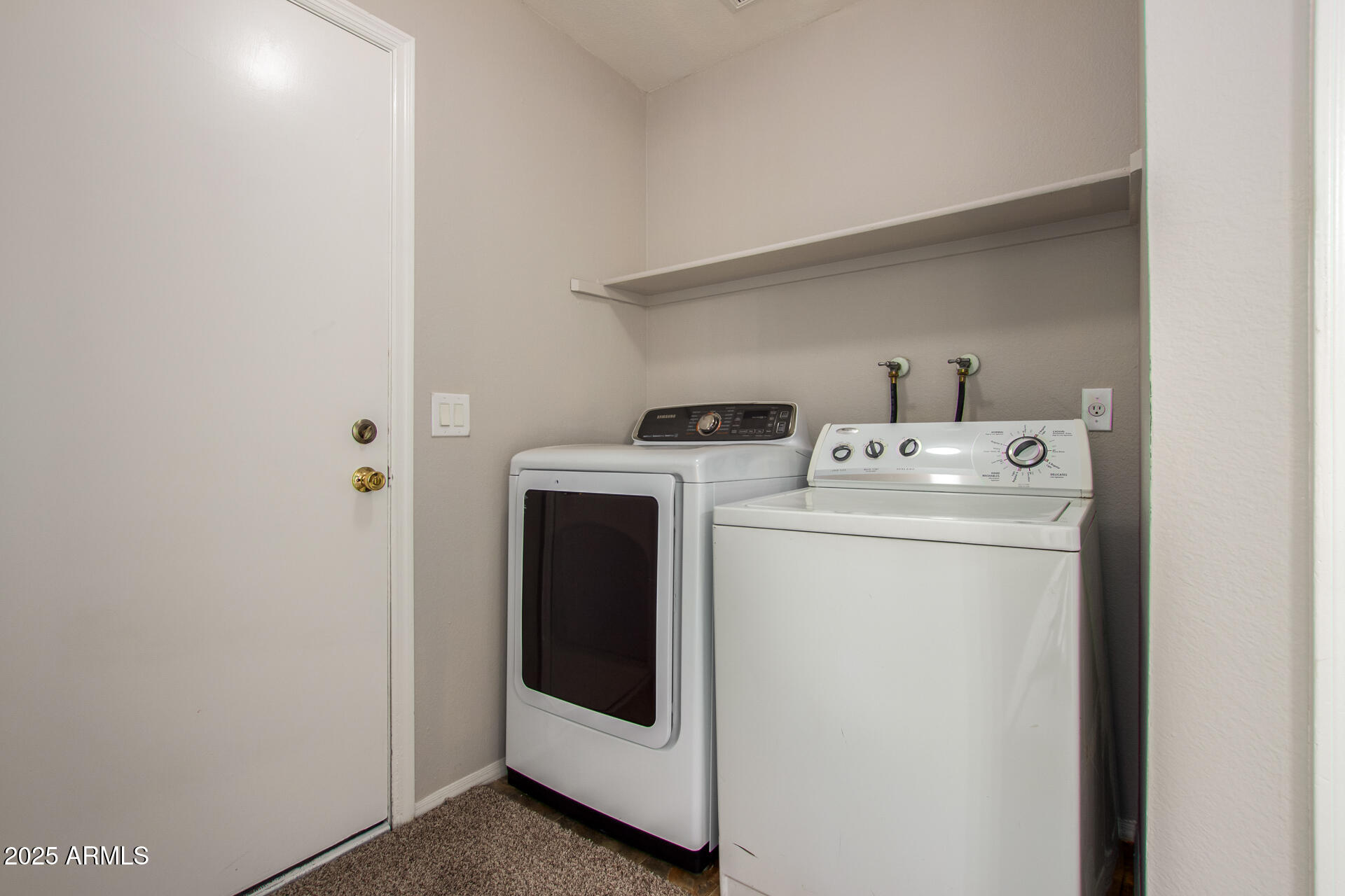 10015 North 66th Drive Glendale, AZ 85302 - Photo 14 of 20 a utility room with dryer and washer