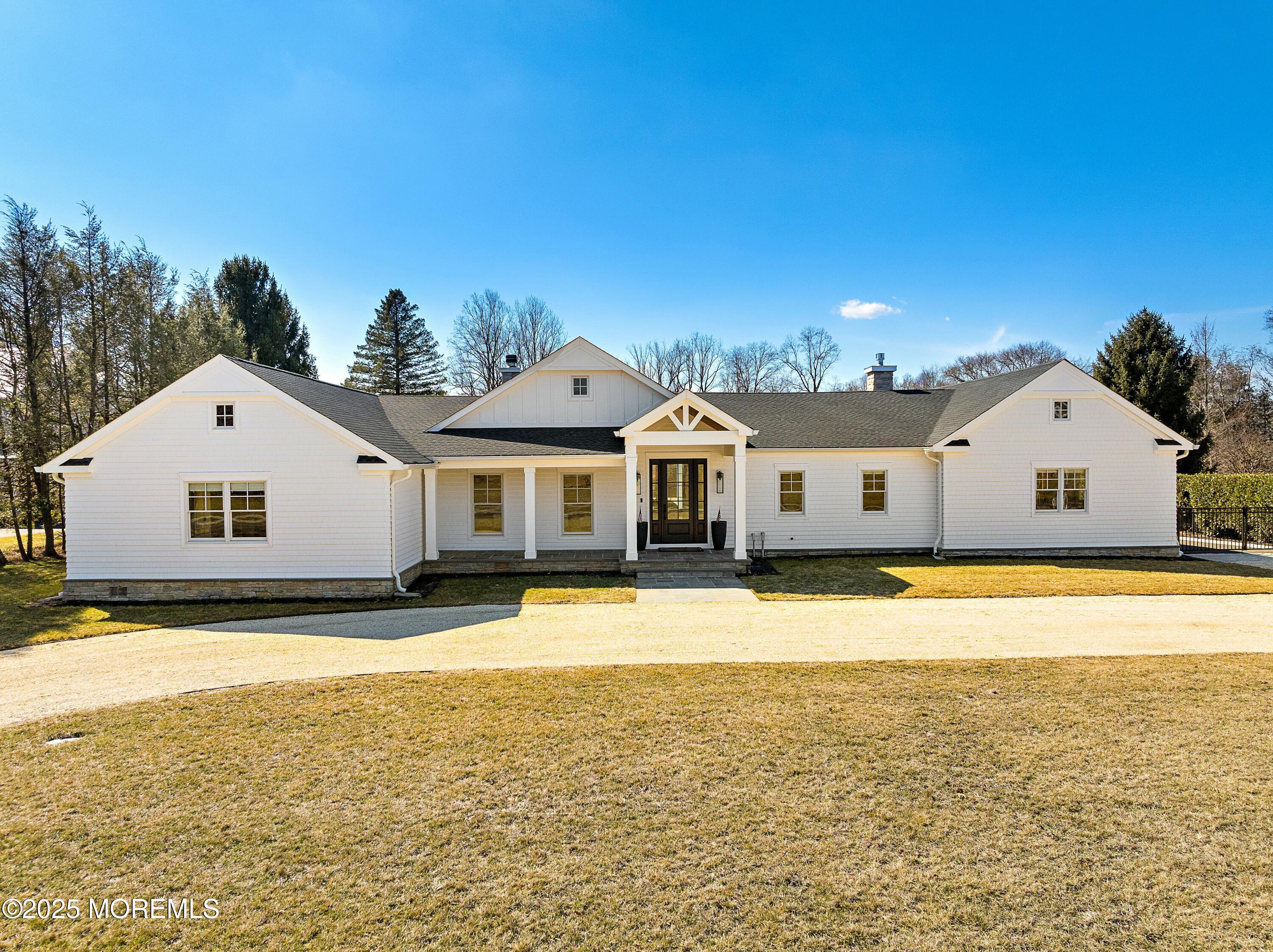 615 Harding Road Little Silver, NJ 07739 - Photo 2 of 94 a front view of house with yard and swimming pool
