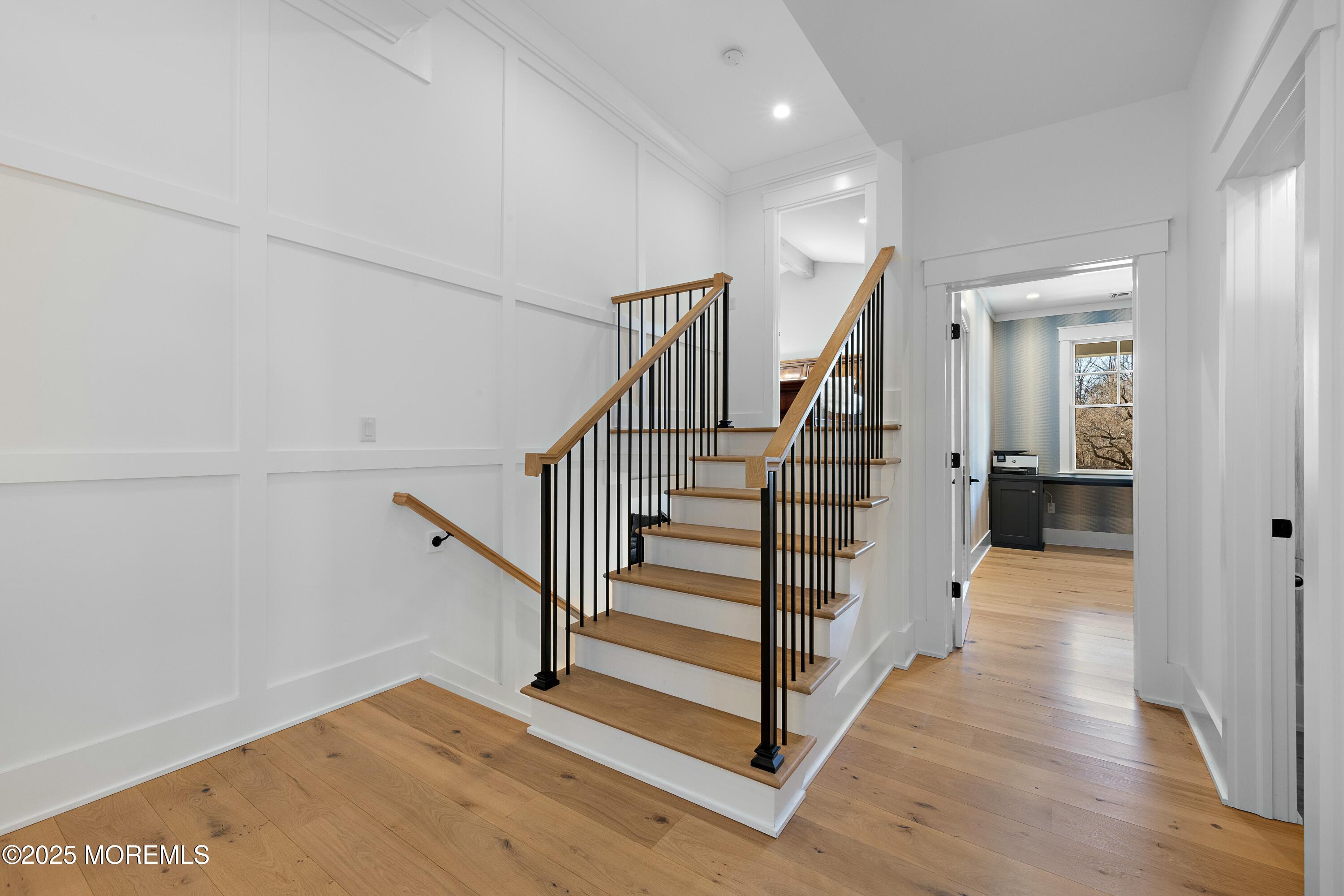 615 Harding Road Little Silver, NJ 07739 - Photo 32 of 94 a view of a hallway with wooden floor and entryway
