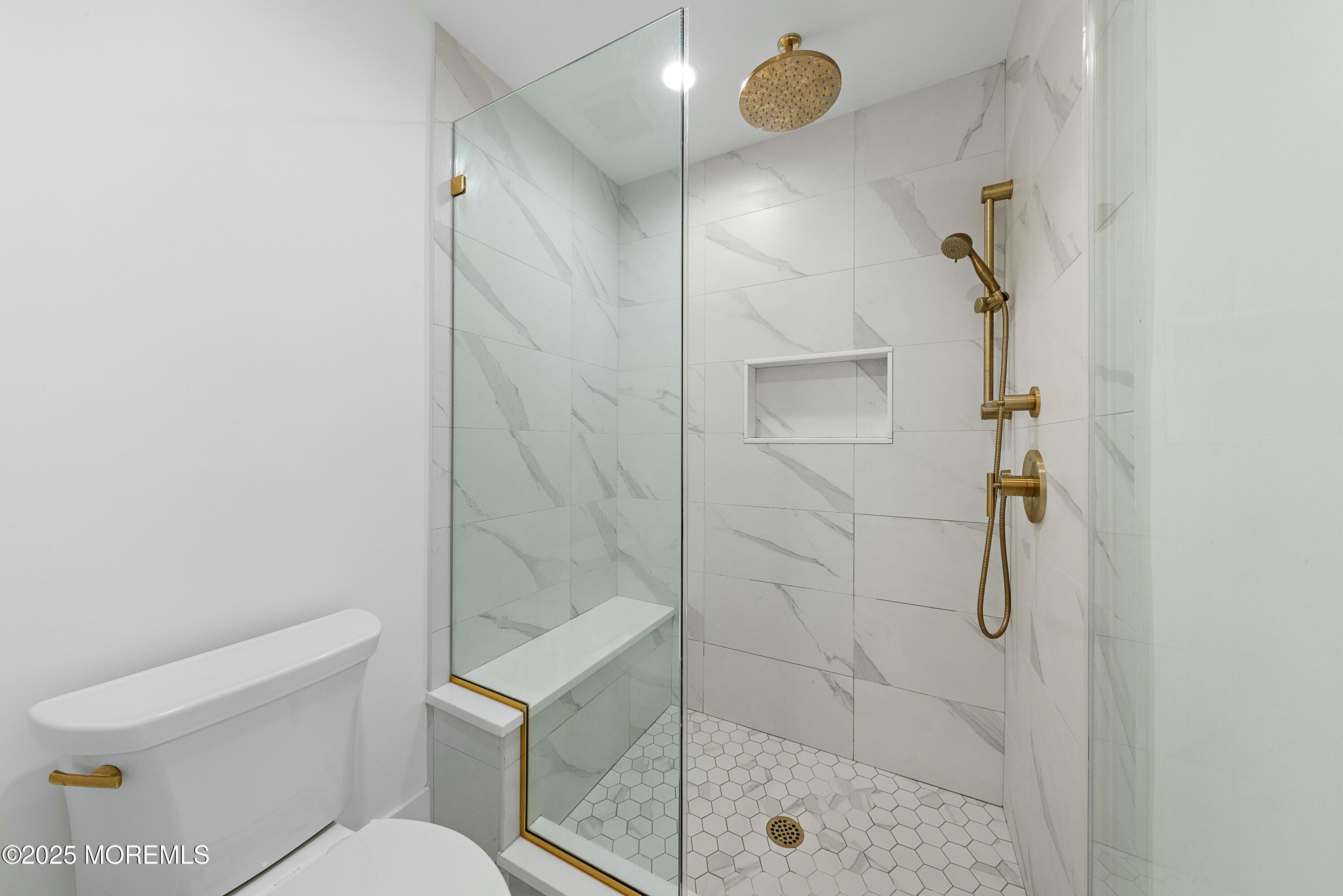615 Harding Road Little Silver, NJ 07739 - Photo 52 of 94 a bathroom with a shower and toilet
