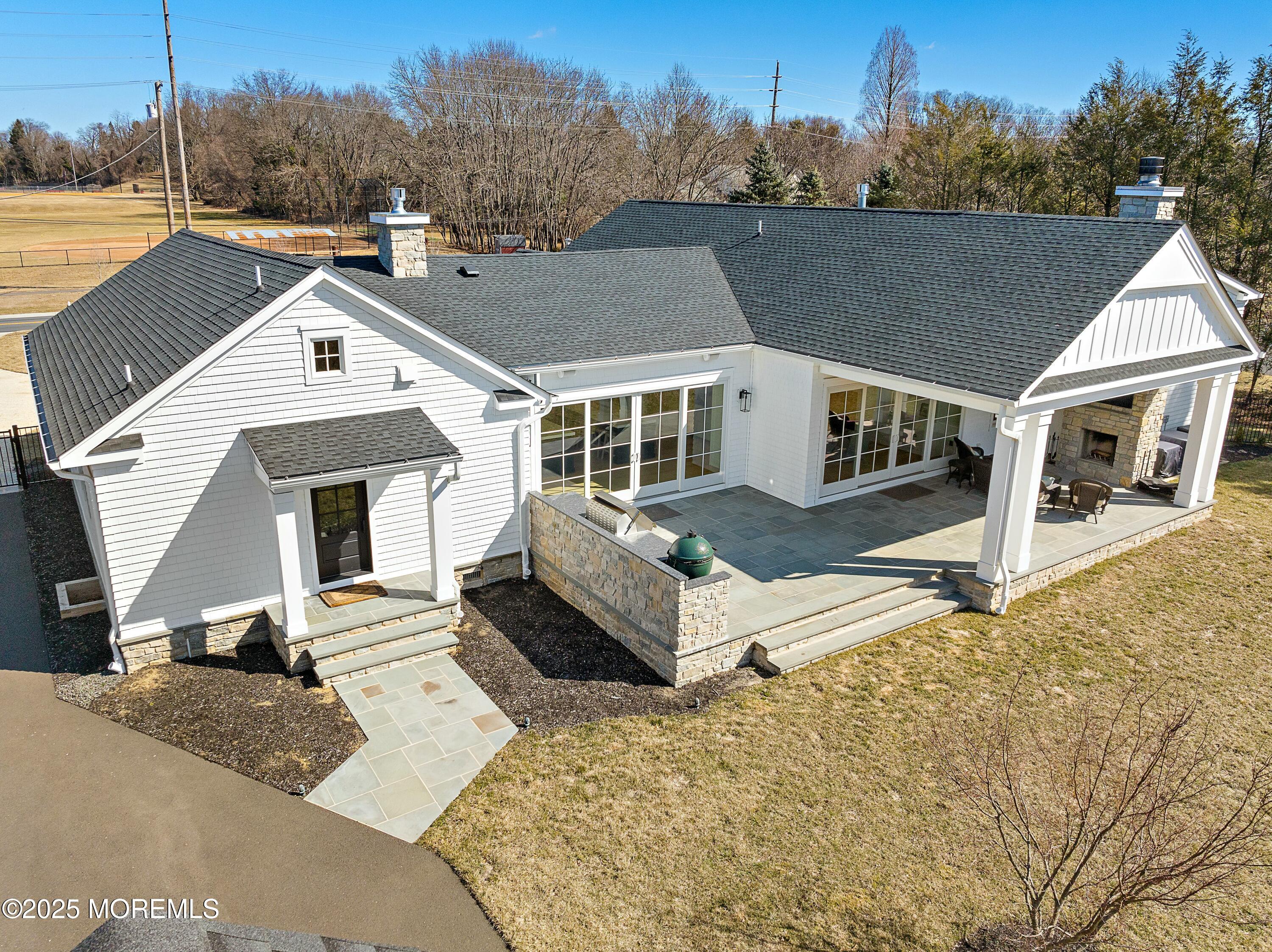 615 Harding Road Little Silver, NJ 07739 - Photo 82 of 94 a front view of a house with a yard