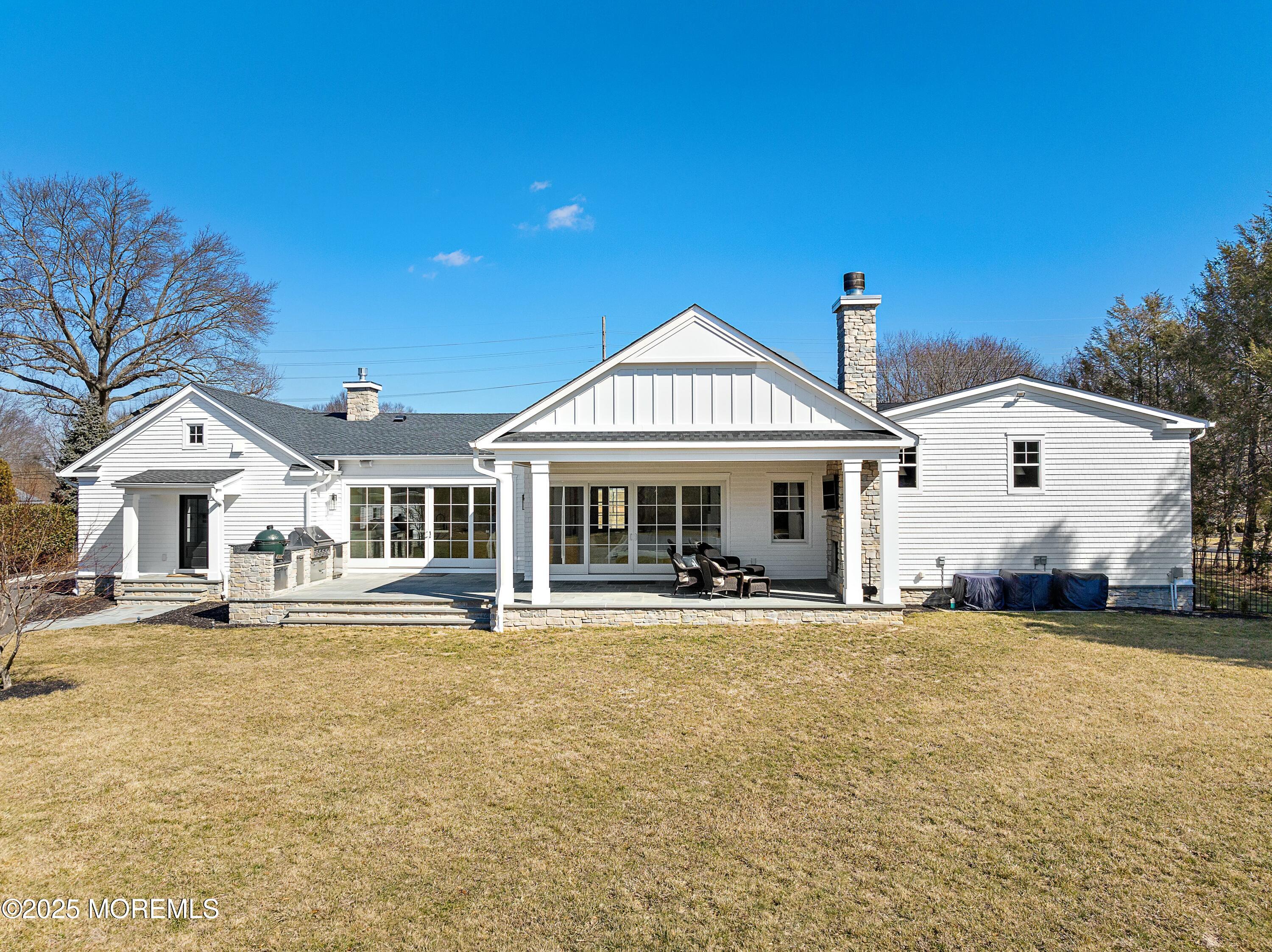 615 Harding Road Little Silver, NJ 07739 - Photo 83 of 94 a front view of a house with a yard