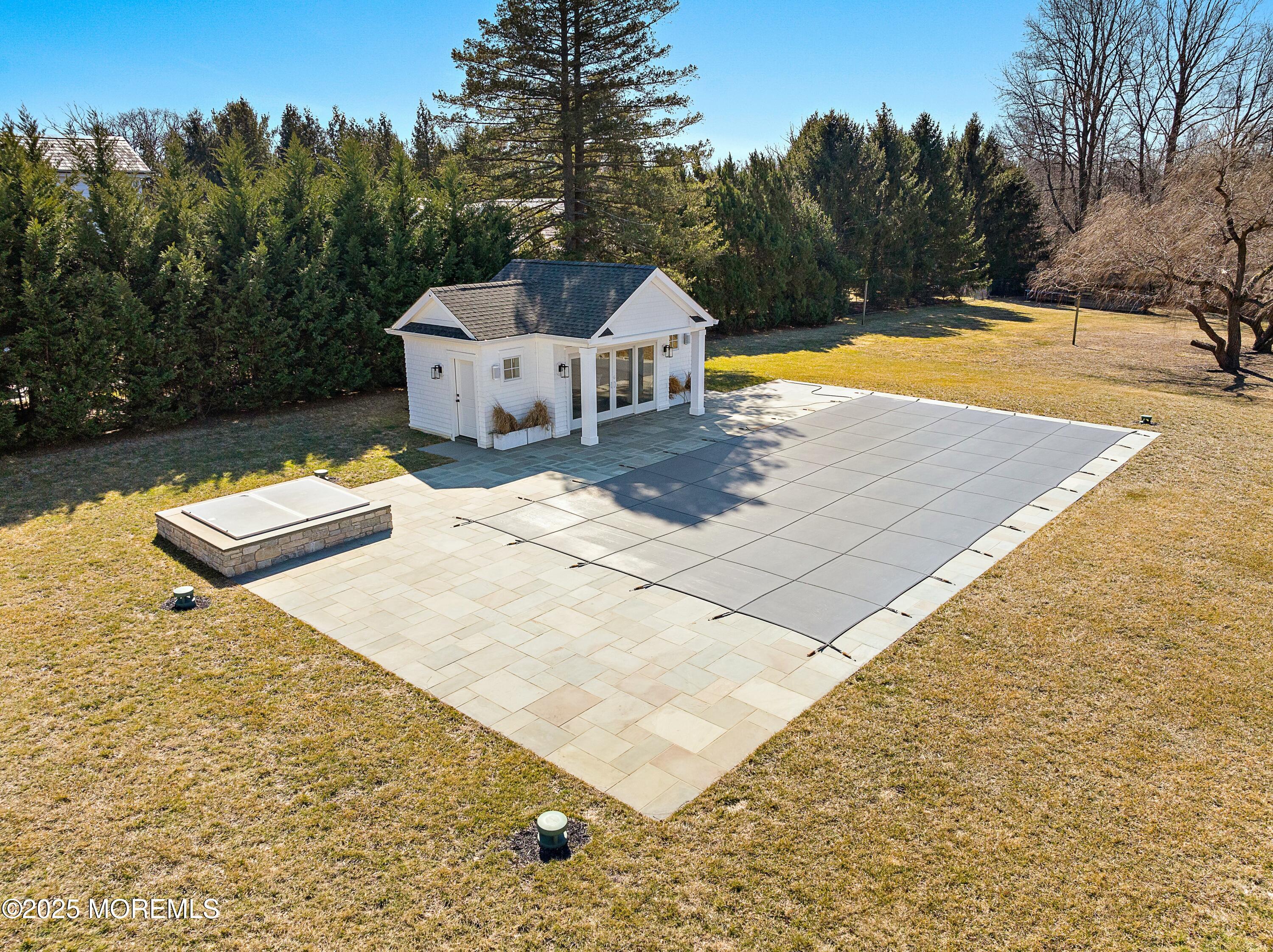 615 Harding Road Little Silver, NJ 07739 - Photo 85 of 94 a view of a swimming pool with a yard