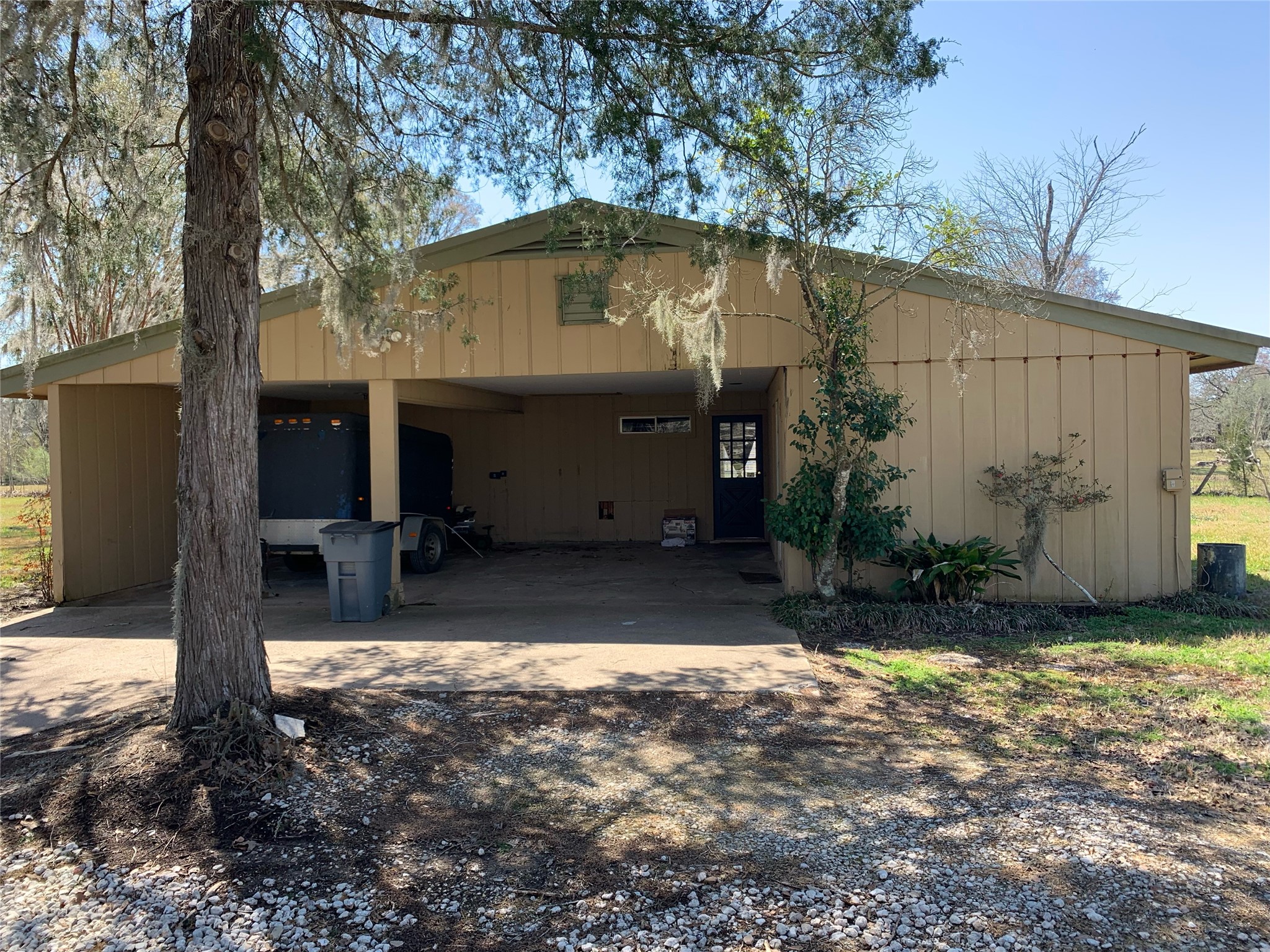 29229 Sheffield Road Waller, TX 77484 - Photo 2 of 16 Two space carport with the entrance to the home.