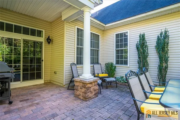 a view of a lounge chairs in the patio