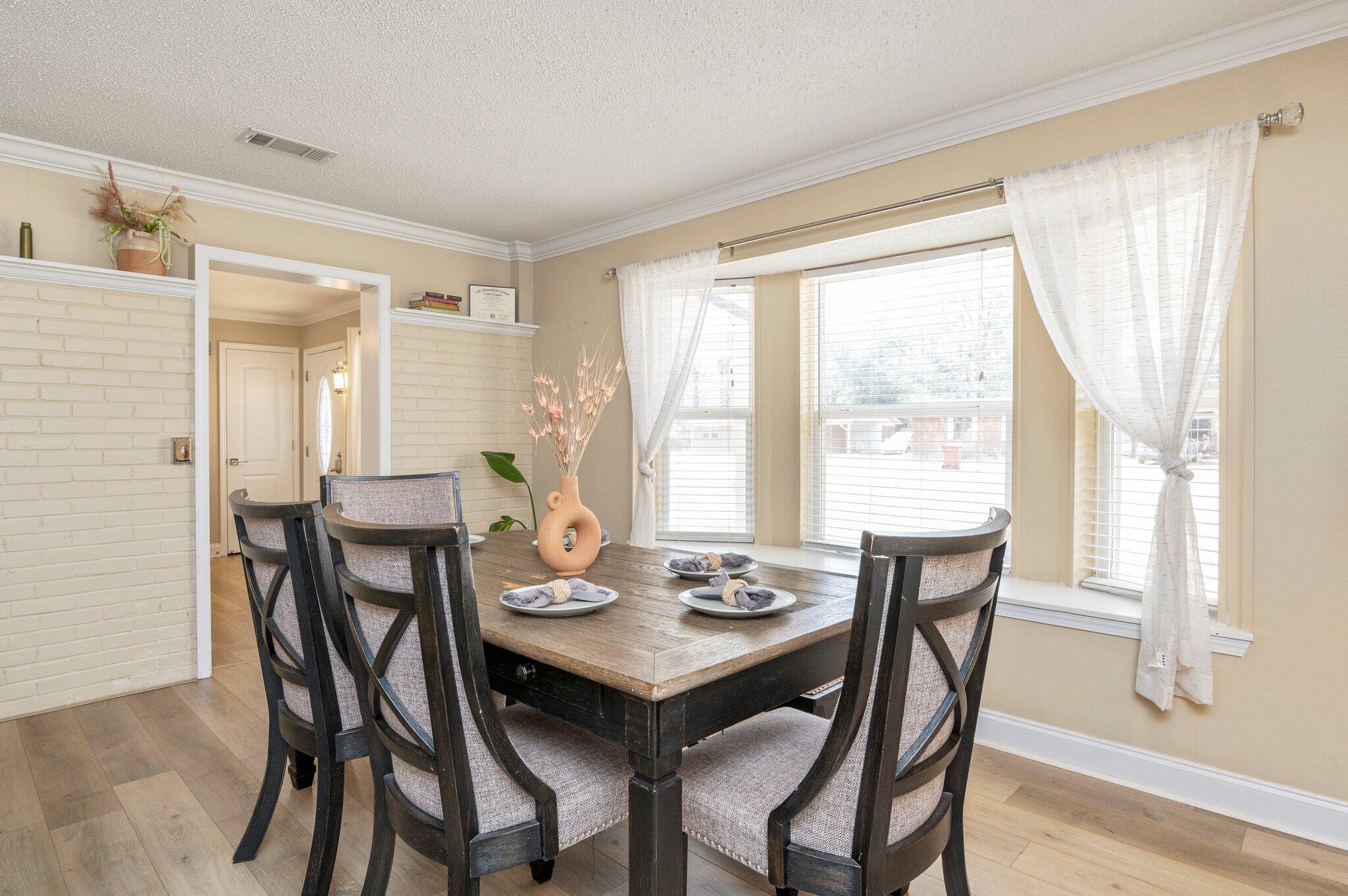 149 Shady Lane Crestview, FL 32536 - Photo 26 of 50 a view of a dining room with furniture and window