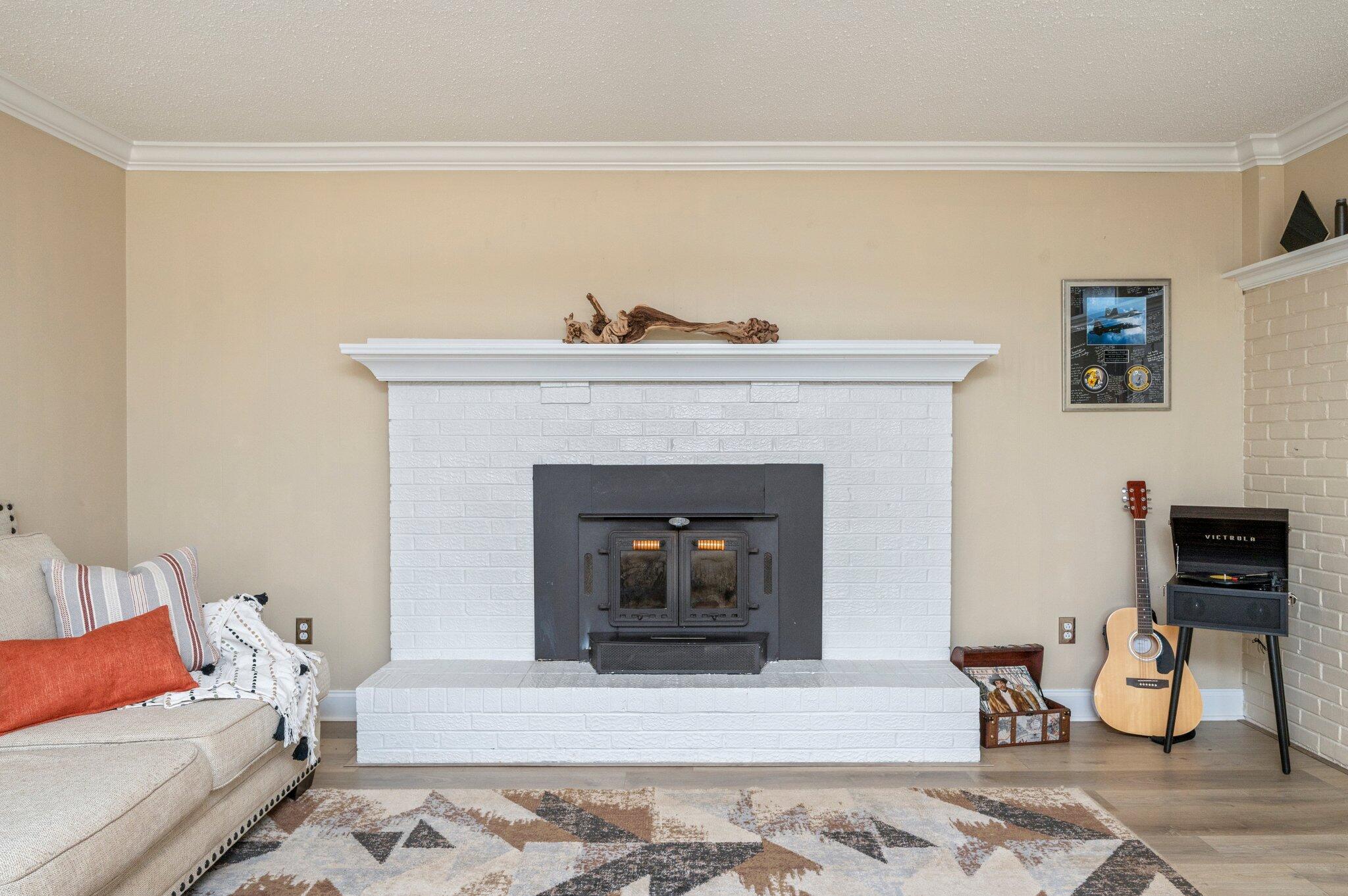 149 Shady Lane Crestview, FL 32536 - Photo 27 of 50 a living room with furniture and a fireplace