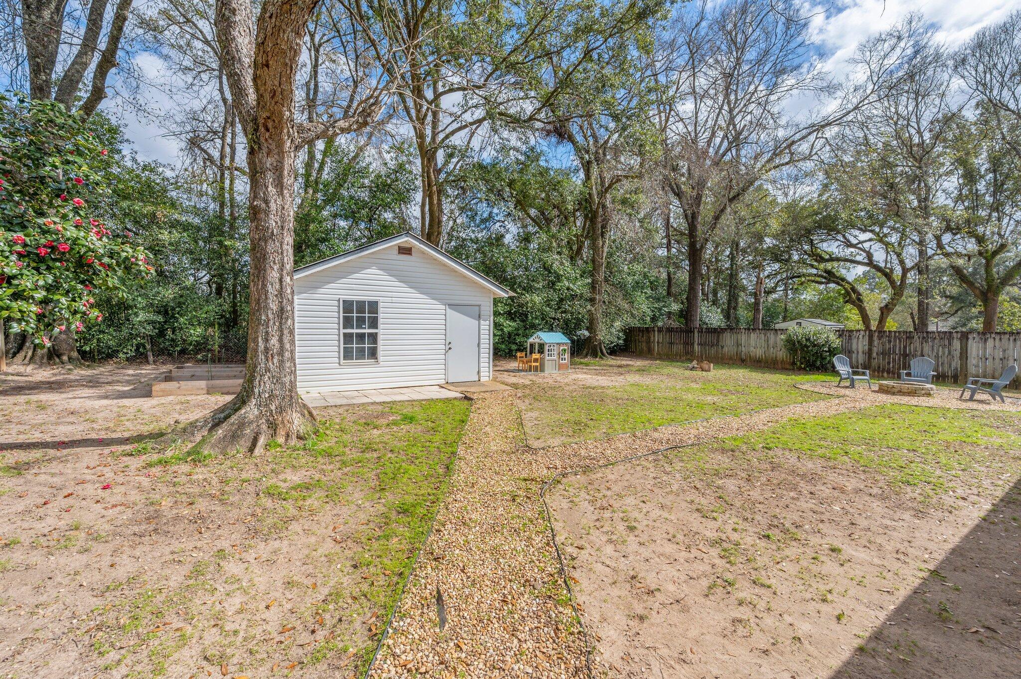 149 Shady Lane Crestview, FL 32536 - Photo 42 of 50 a view of backyard of house with green space