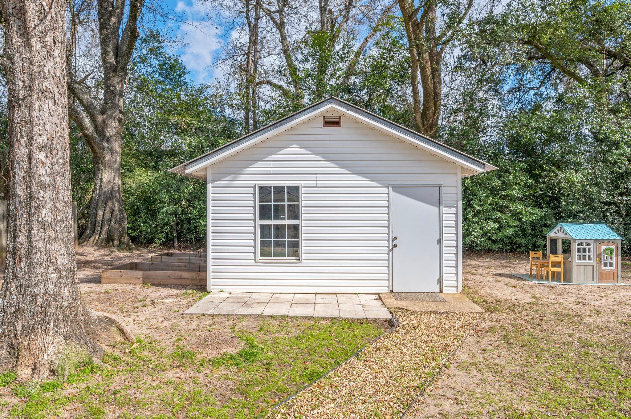 149 Shady Lane Crestview, FL 32536 - Photo 44 of 50 a front view of a house with a yard