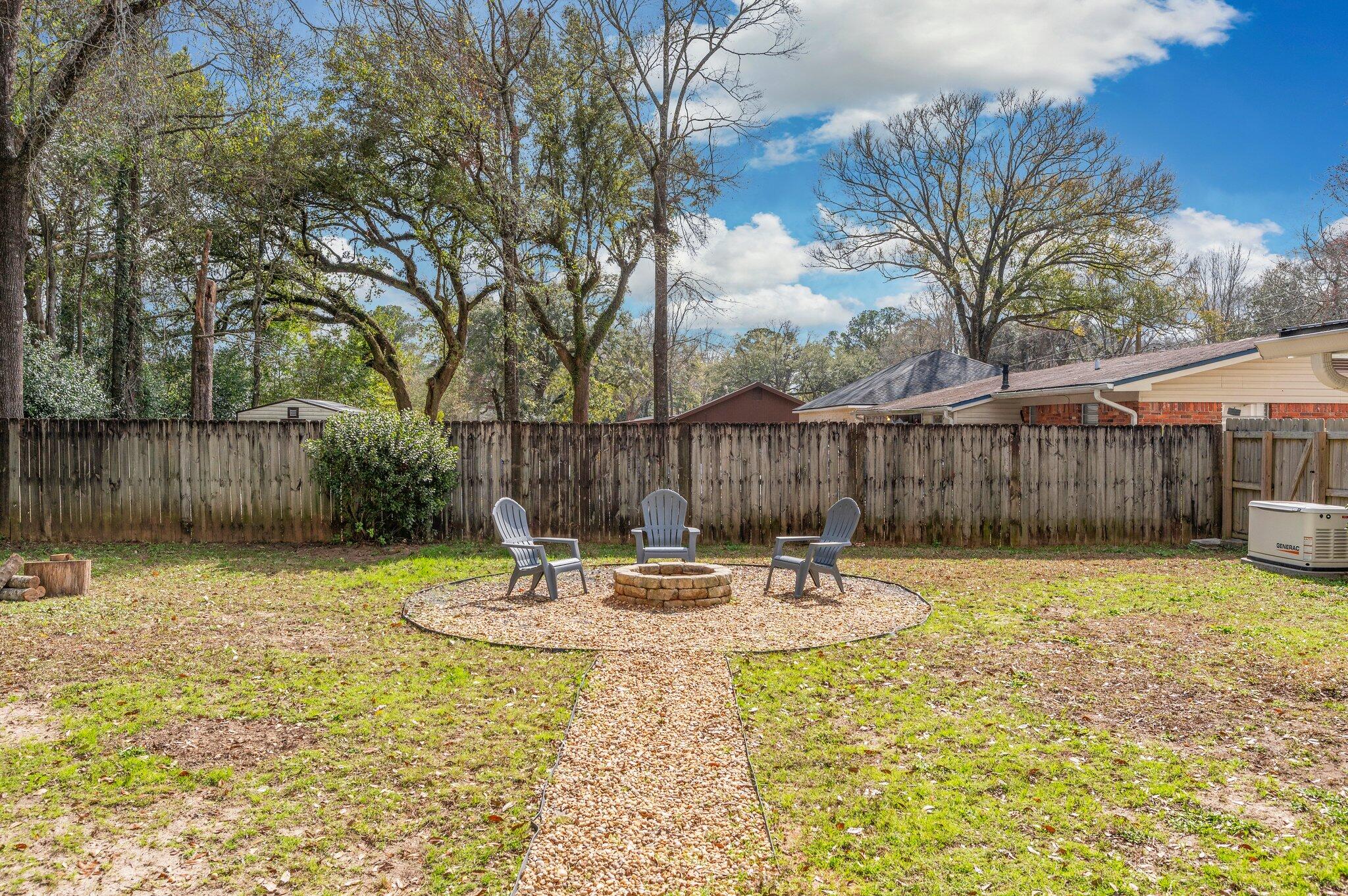 149 Shady Lane Crestview, FL 32536 - Photo 45 of 50 a swimming pool with wooden fence
