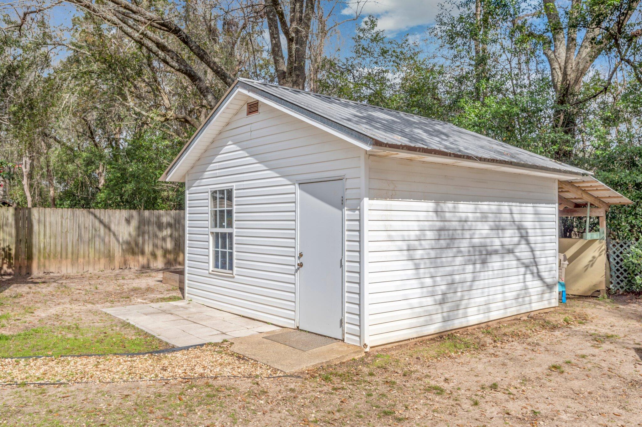 149 Shady Lane Crestview, FL 32536 - Photo 46 of 50 a view of a house with a backyard