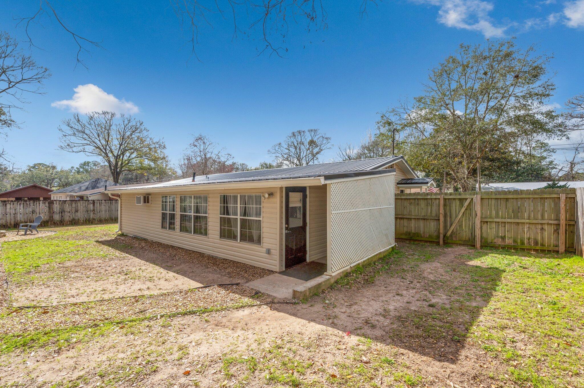 149 Shady Lane Crestview, FL 32536 - Photo 50 of 50 a view of a house with a yard and sitting area