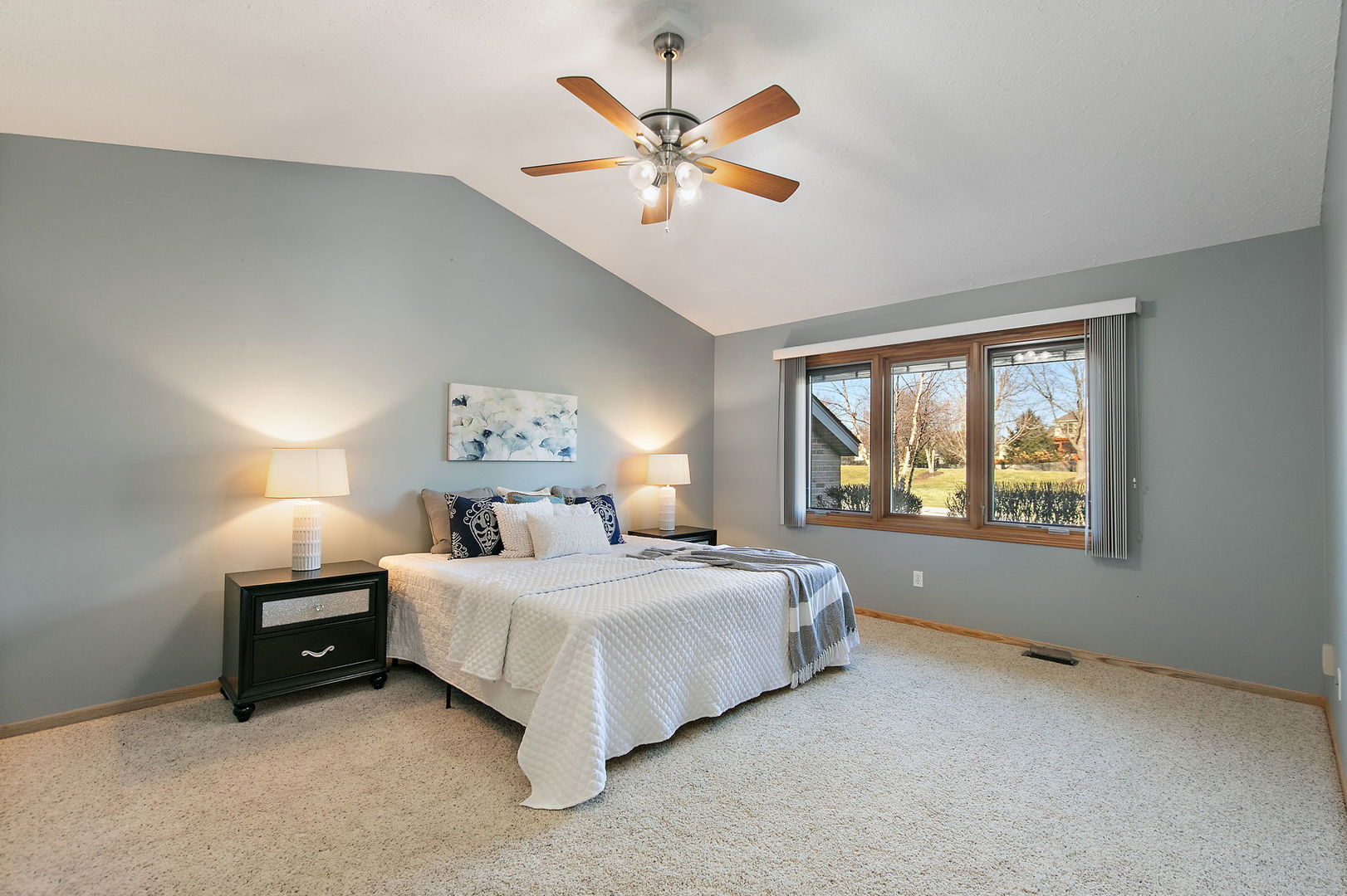 543 Brant Circle DeKalb, IL 60115 - Photo 13 of 28 a bedroom with a bed and window