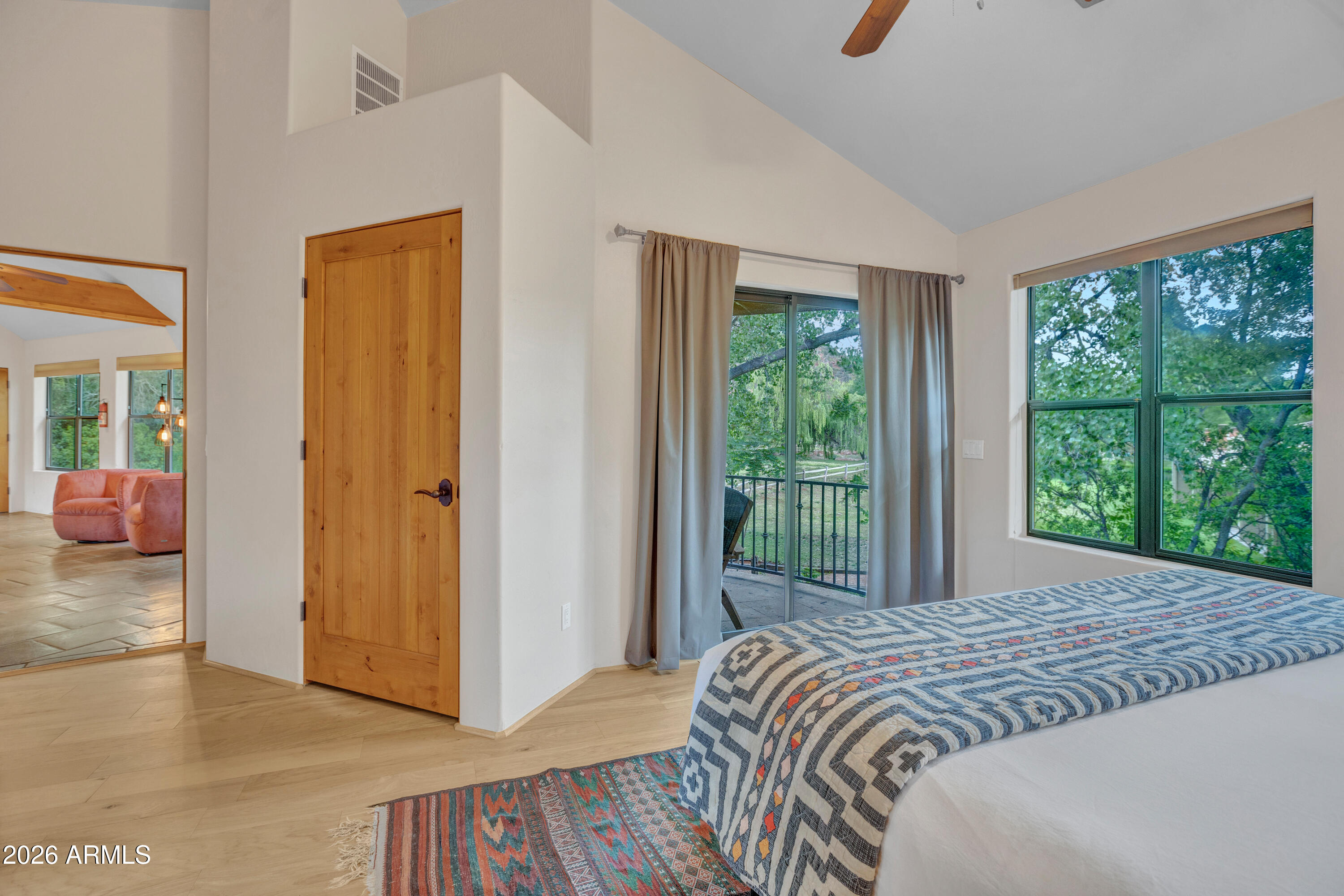 55 Ranch House Circle Sedona, AZ 86336 - Photo 50 of 61 a bedroom with a bed and a large window