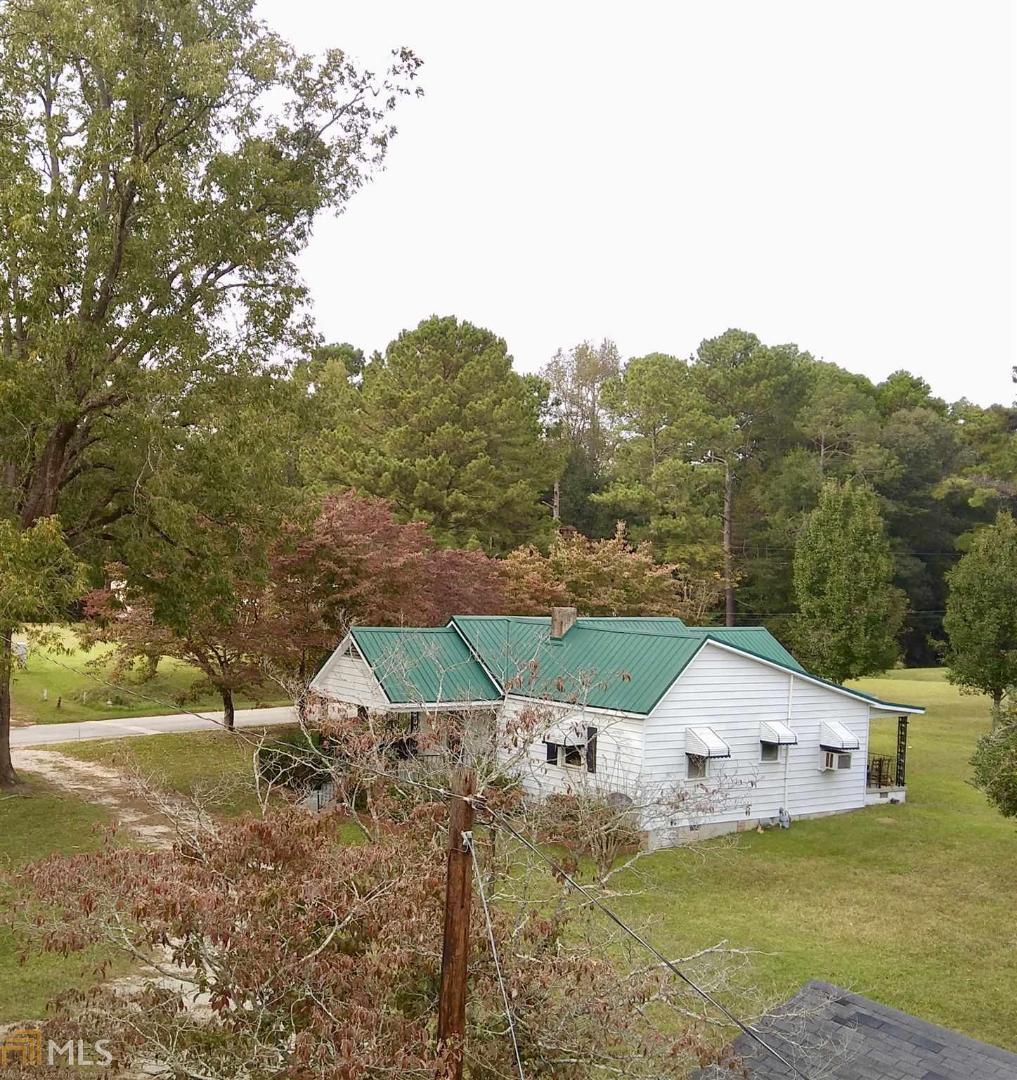 1521 North Rhodes Street Union Point, GA 30669 - Photo 1 of 1 a house view with a ocean view