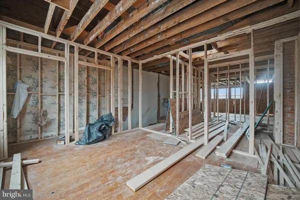 a view of a room with wooden walls