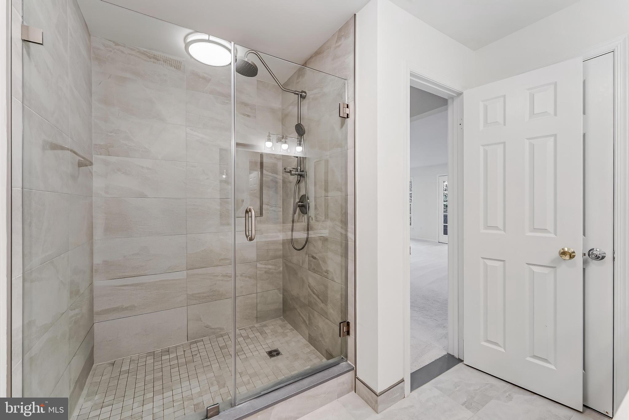 1483 Church Hill Place Reston, VA 20194 - Photo 13 of 38 a bathroom with a shower