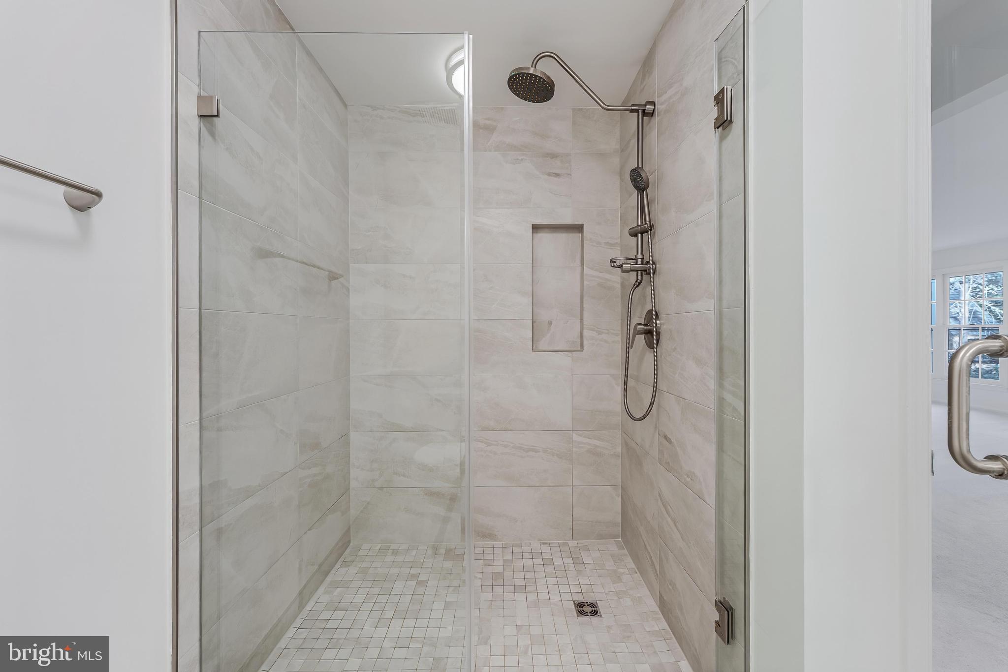 1483 Church Hill Place Reston, VA 20194 - Photo 13 of 38 a bathroom with a shower