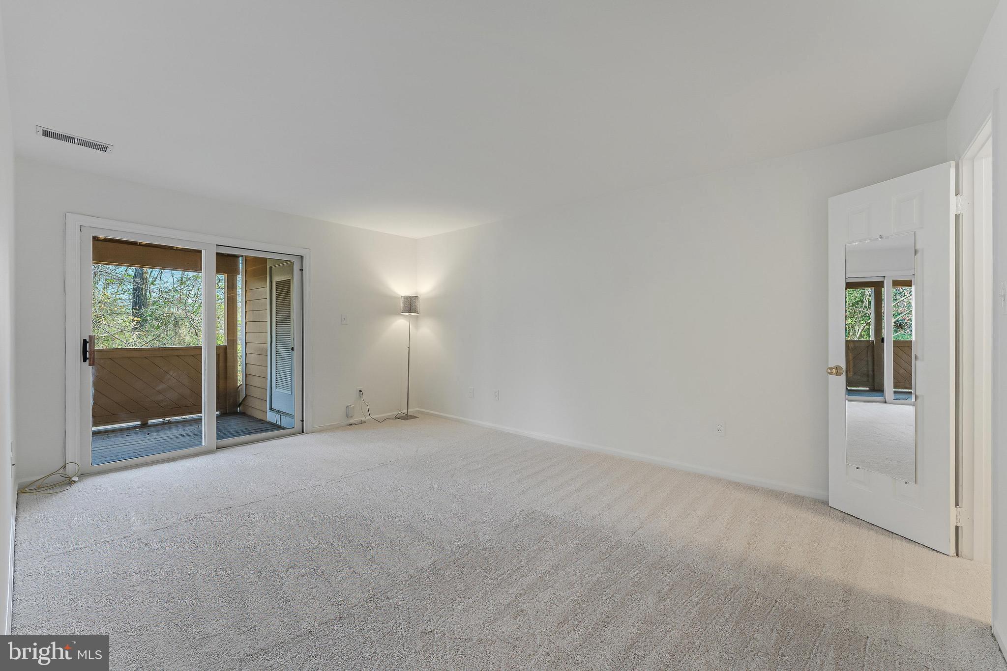 1483 Church Hill Place Reston, VA 20194 - Photo 16 of 38 an empty room with windows