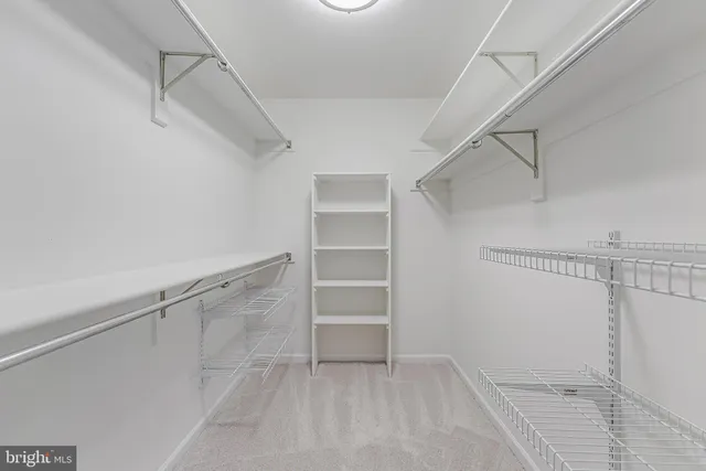 a view of empty room with windows