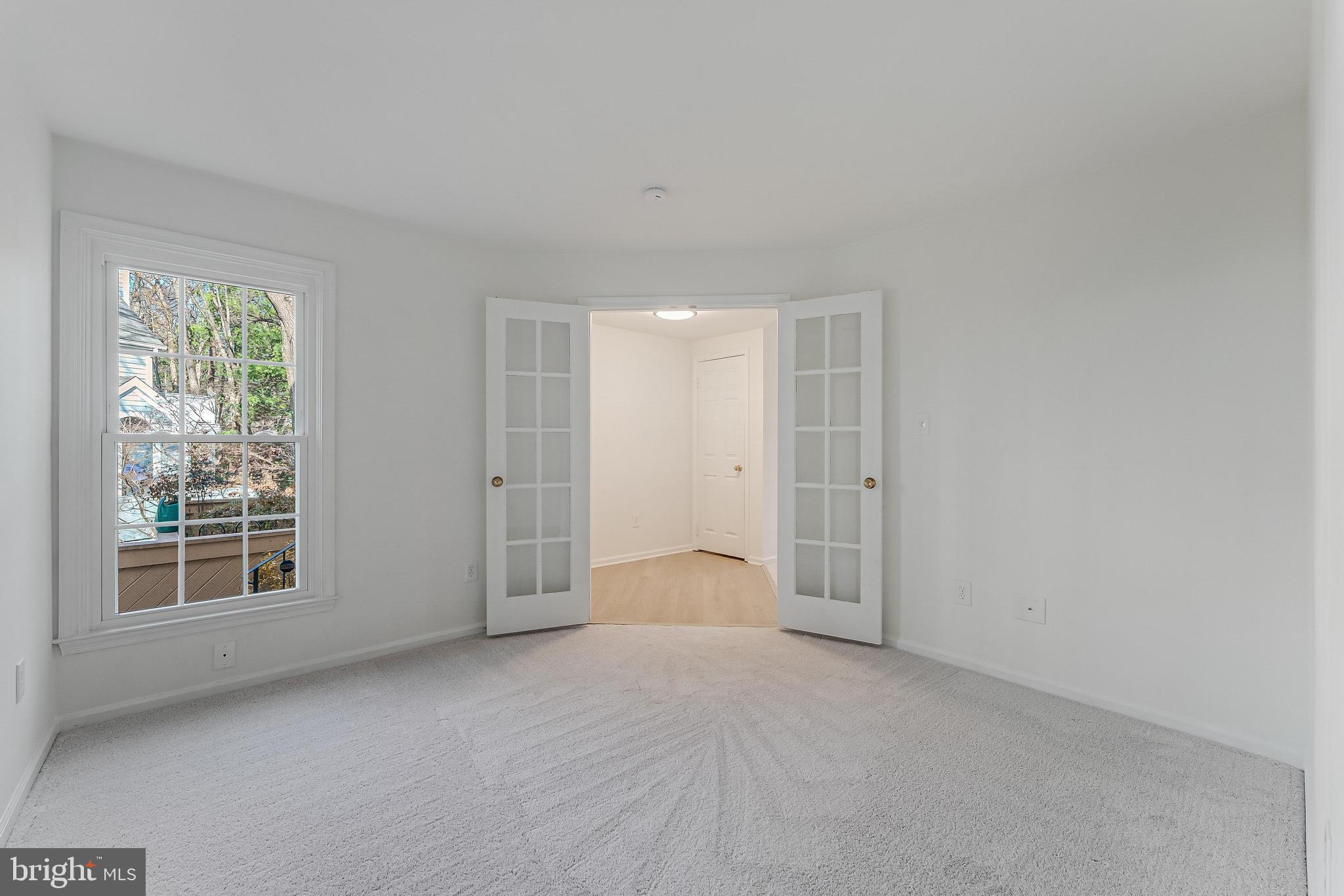 1483 Church Hill Place Reston, VA 20194 - Photo 20 of 38 a view of empty room with windows
