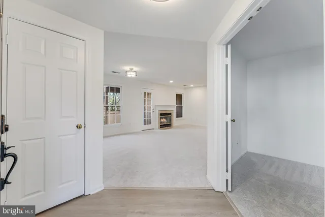 an empty room with white door